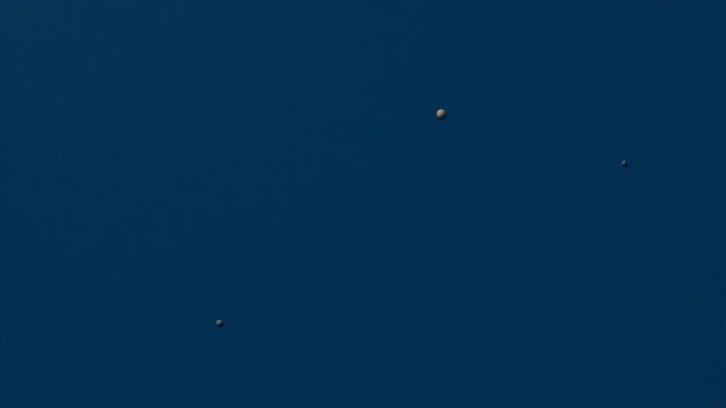Abstract editorial image with scattered small dots in deep navy blue representing open-weight AI policy coalition.