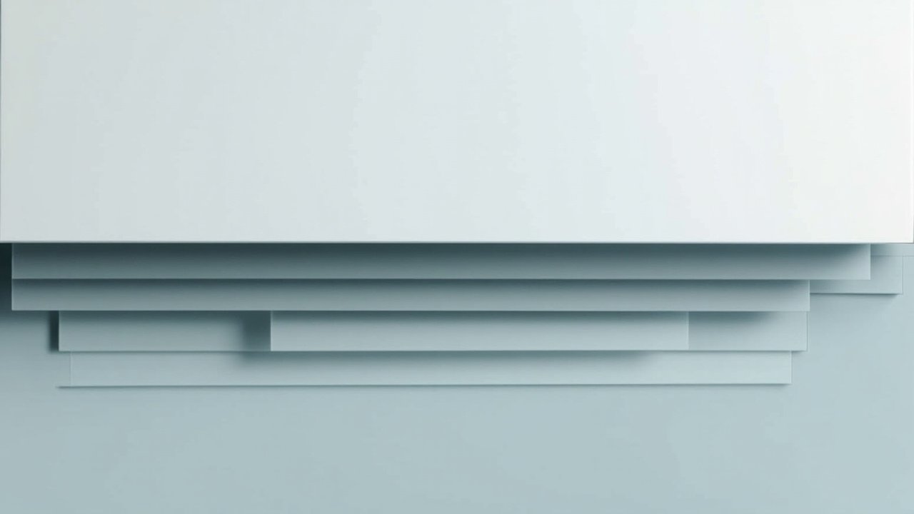 Layered rectangular slabs in muted gray-blue and pale slate tones representing stacked chip wafers in inventory